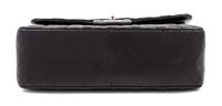 A Chanel Black Quilted Lambskin Jumbo Double Flap Bag, 8.25" H x 12" W x 3.5" D; Strap drop: 13.5"- 23.75".