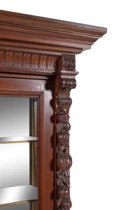 A Black Forest Style Carved Oak Cabinet