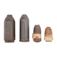 Four Excavated Civil War Artillery Shells: #30 Parrott Bolt, #20 Parrott Shell and Two Hotchkiss