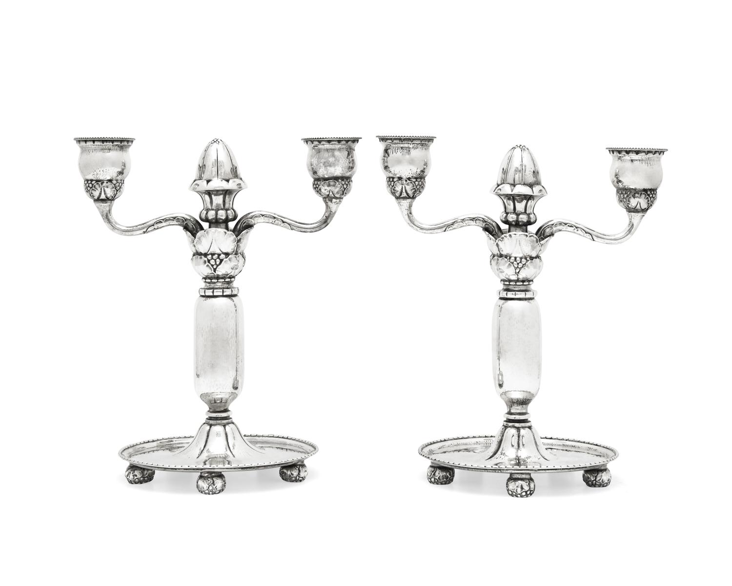 A Pair of Georg Jensen Silver Two-Light Candelabra