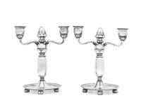 A Pair of Georg Jensen Silver Two-Light Candelabra
