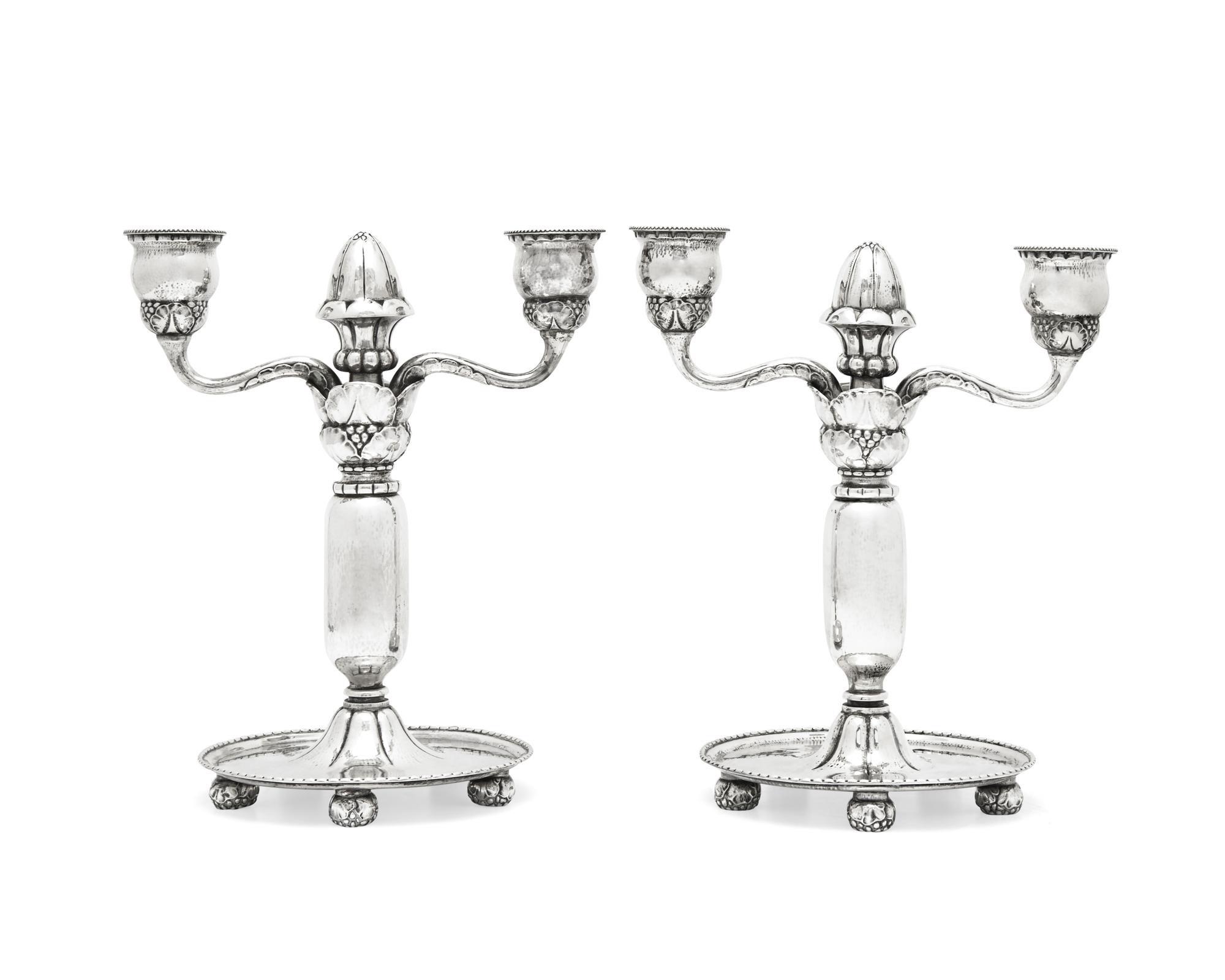 A Pair of Georg Jensen Silver Two-Light Candelabra