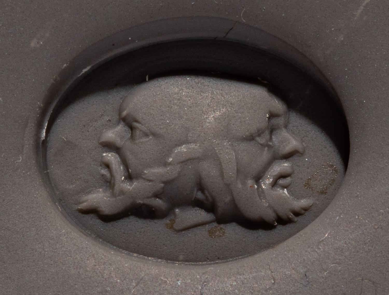 A Roman Red Jasper Ring Stone with a Three-Faced Gryllos