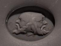 A Roman Red Jasper Ring Stone with a Three-Faced Gryllos