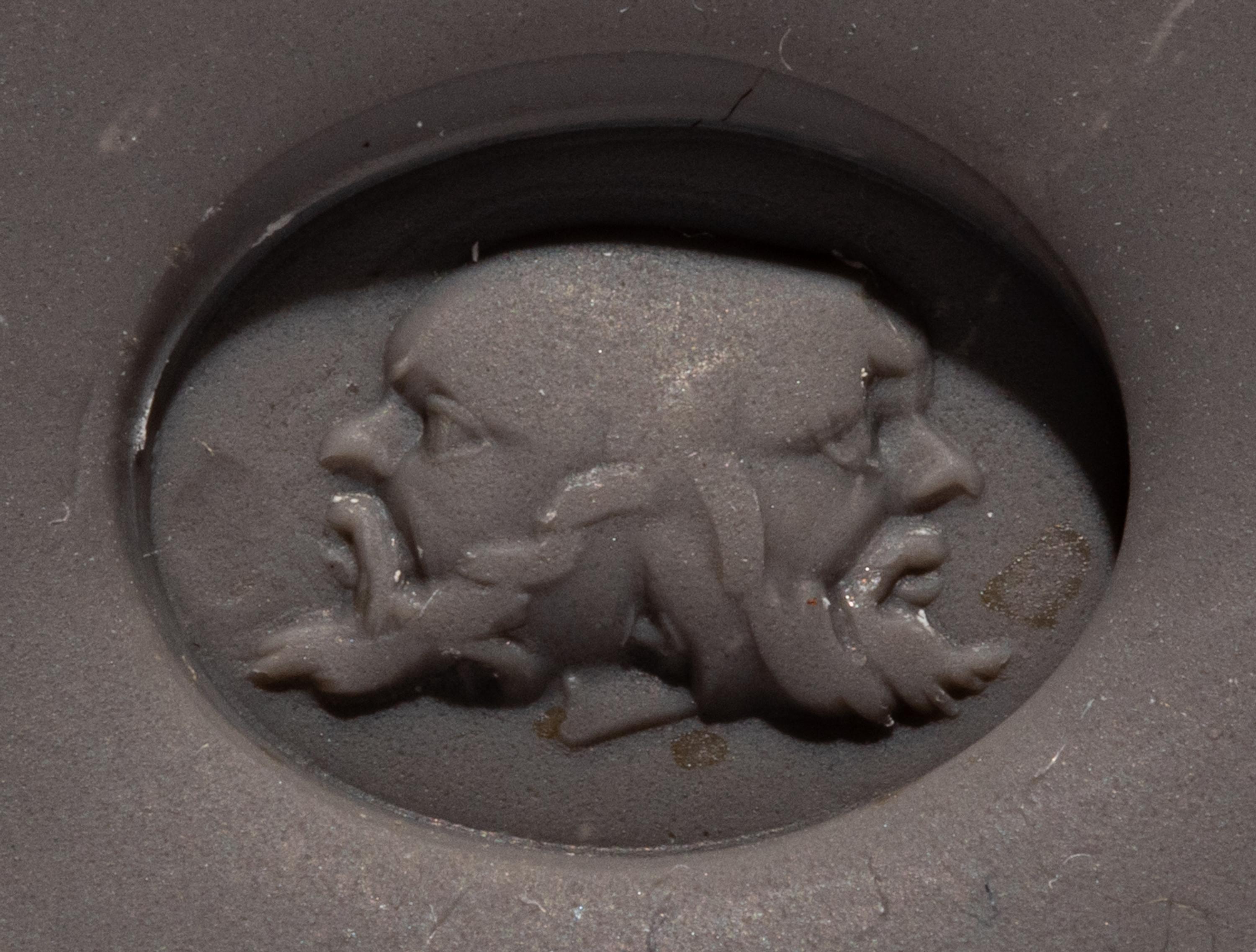 A Roman Red Jasper Ring Stone with a Three-Faced Gryllos