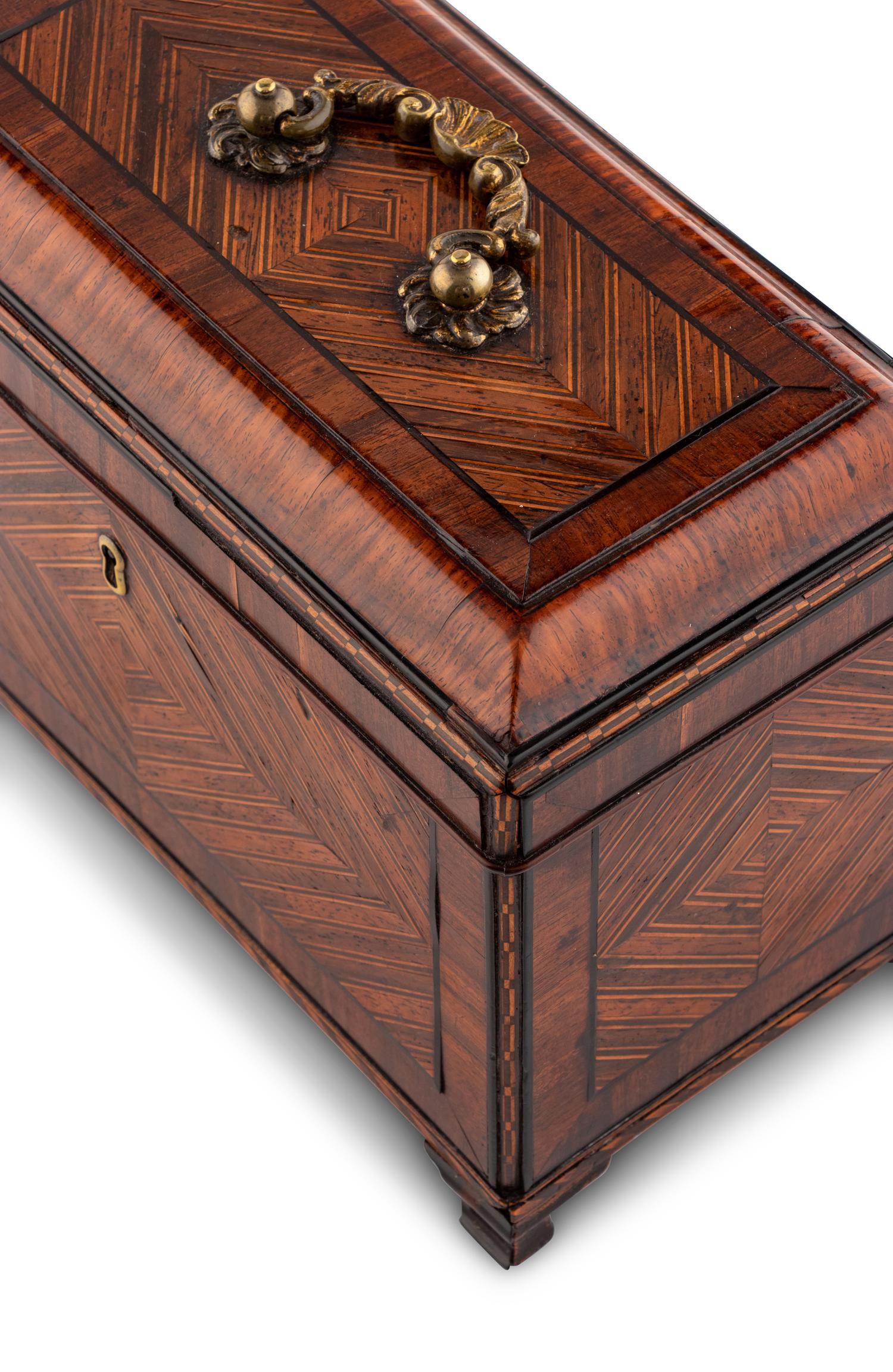 A George III Tulipwood, Ebony and Fruitwood Parquetry Tea Caddy
