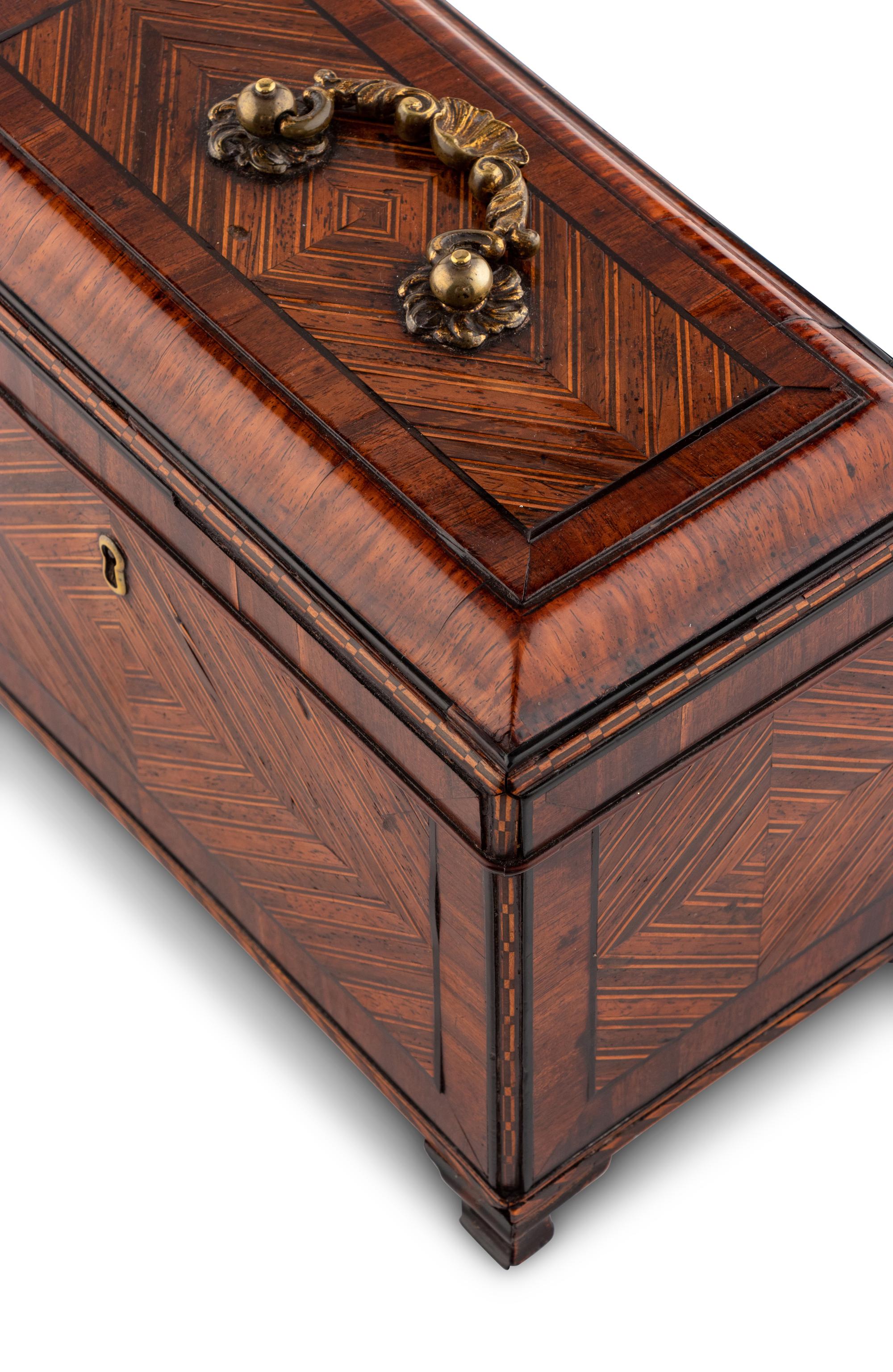 A George III Tulipwood, Ebony and Fruitwood Parquetry Tea Caddy