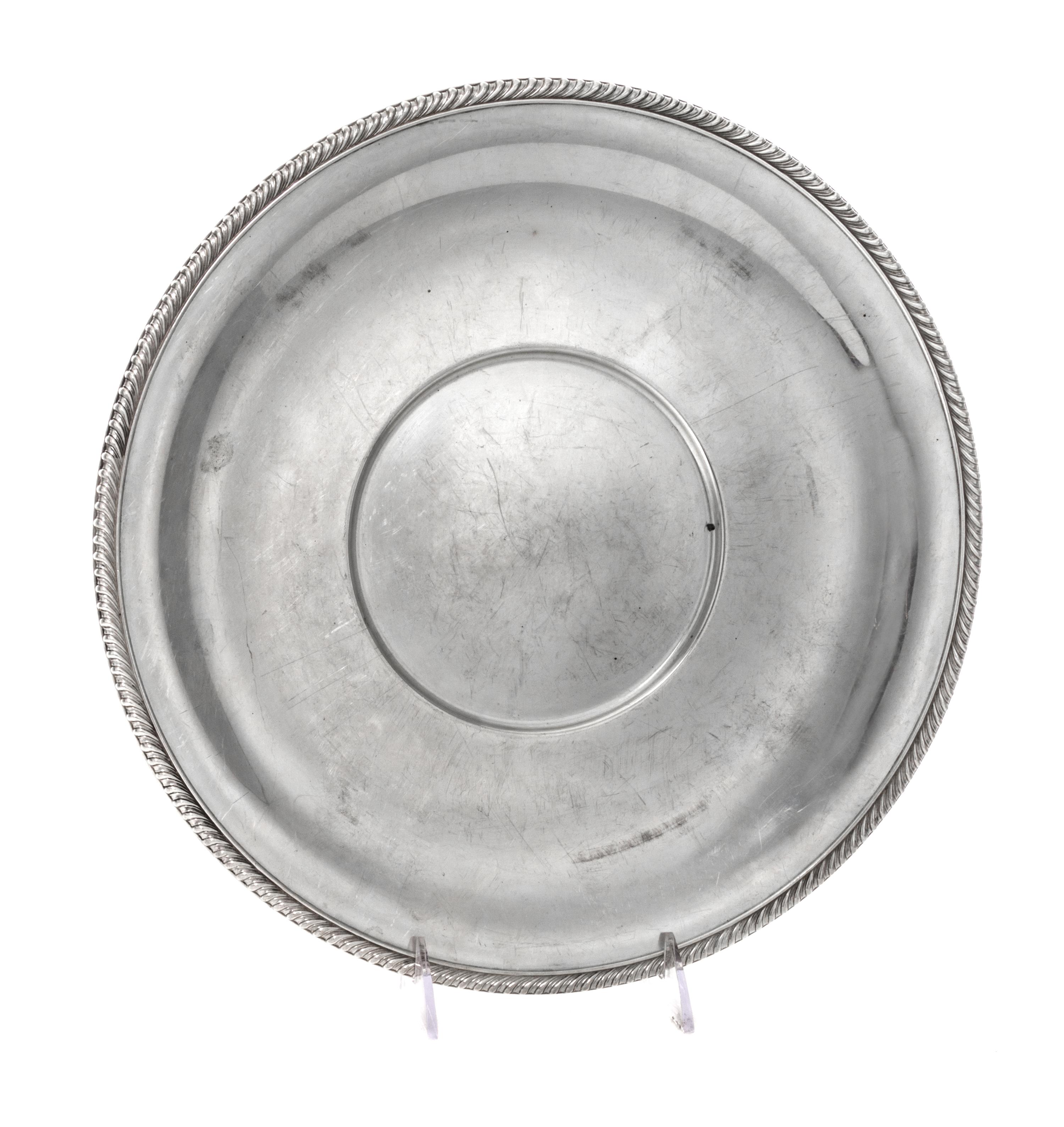 An American Silver Charger, International Silver Co., Meriden, CT Mid 20th Century, circular with gadrooned rim.