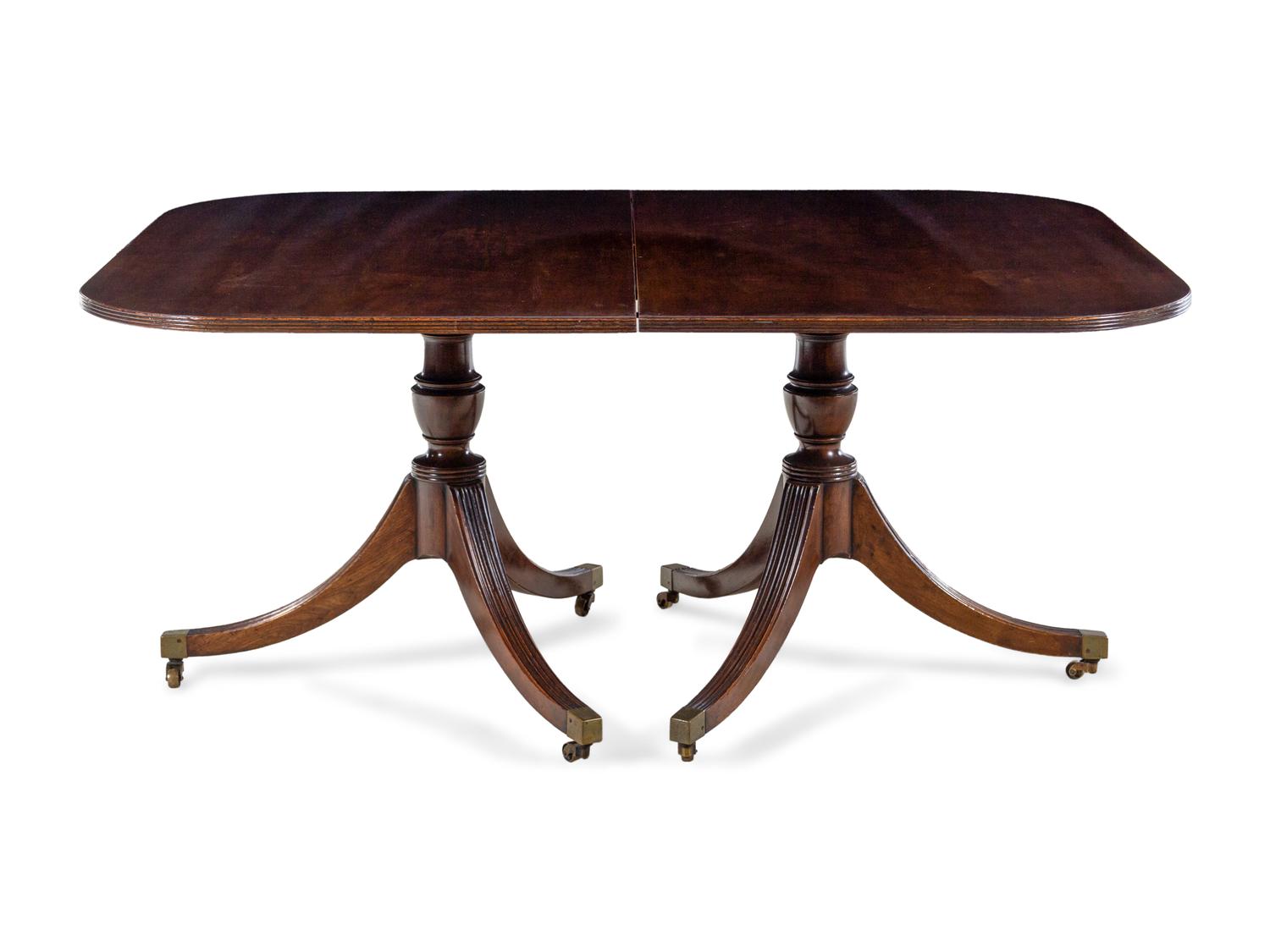 A George III Style Mahogany Triple-Pedestal Dining Table