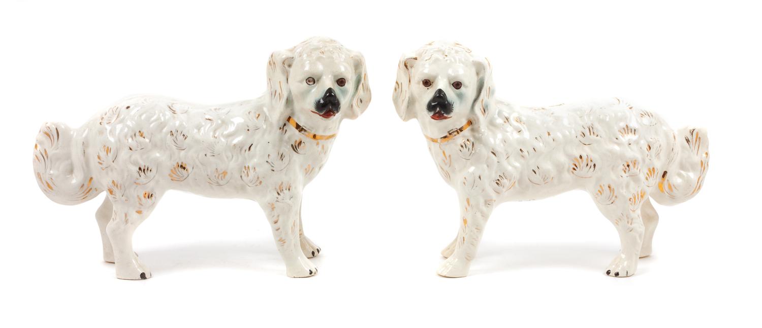 A Pair of Staffordshire Style Great Pyrenees Figures Width 16 inches.