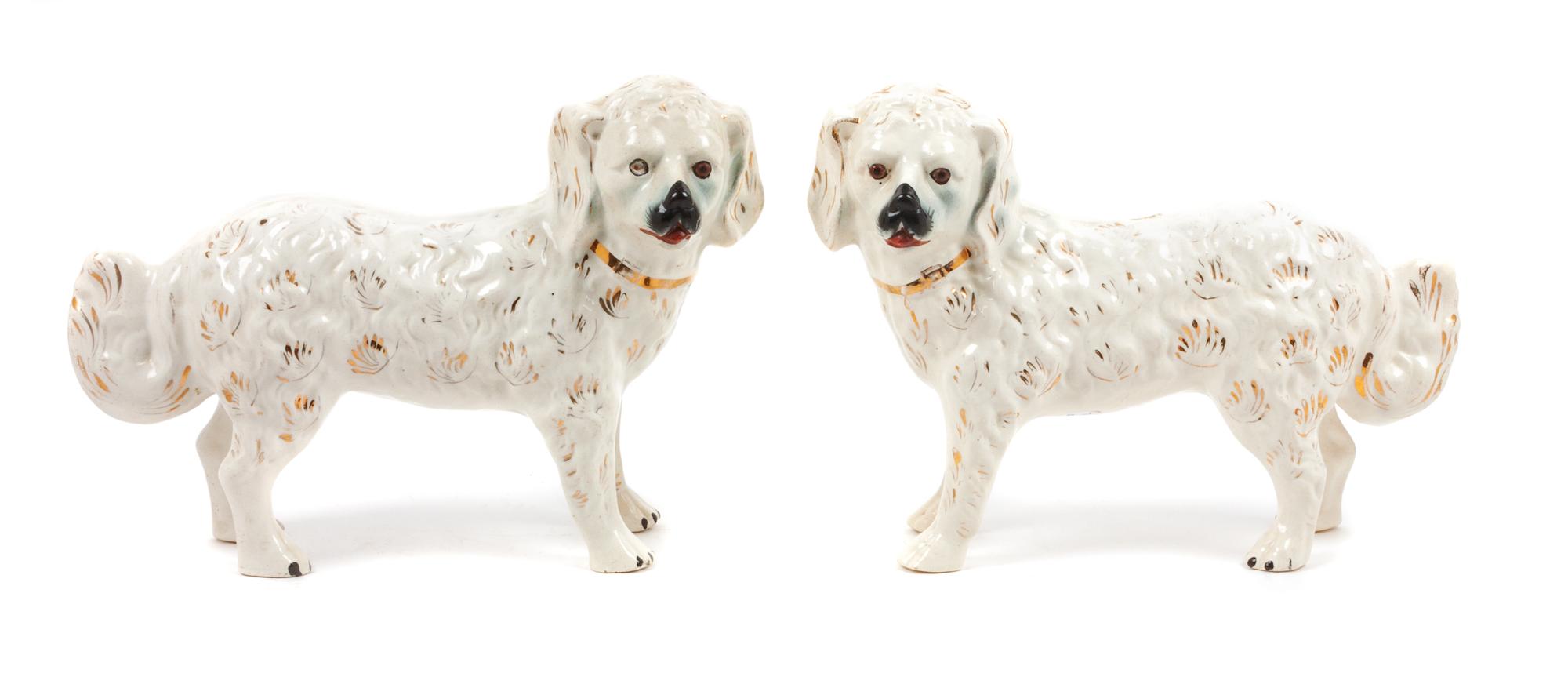A Pair of Staffordshire Style Great Pyrenees Figures Width 16 inches.