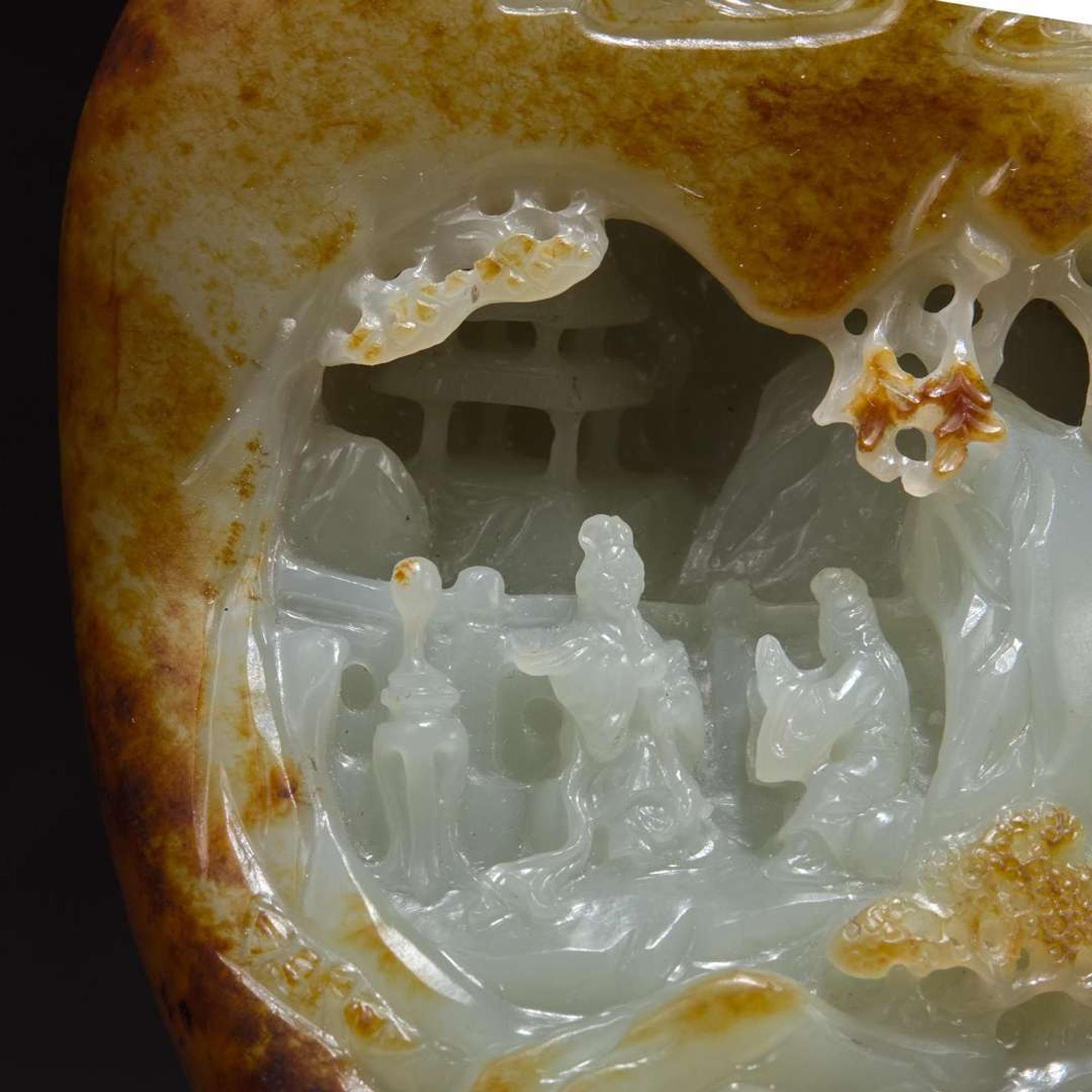 A Chinese russet and pale celadon jade "Mountain" boulder 玉雕山子及底座 Jade late Qing or earlier ????????