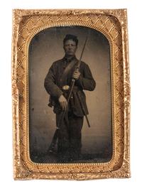 [CIVIL WAR]. Tintype of Private Oliver W. Inskeep, Company F, 30th Iowa Regiment, with musket and fixed bayonet.