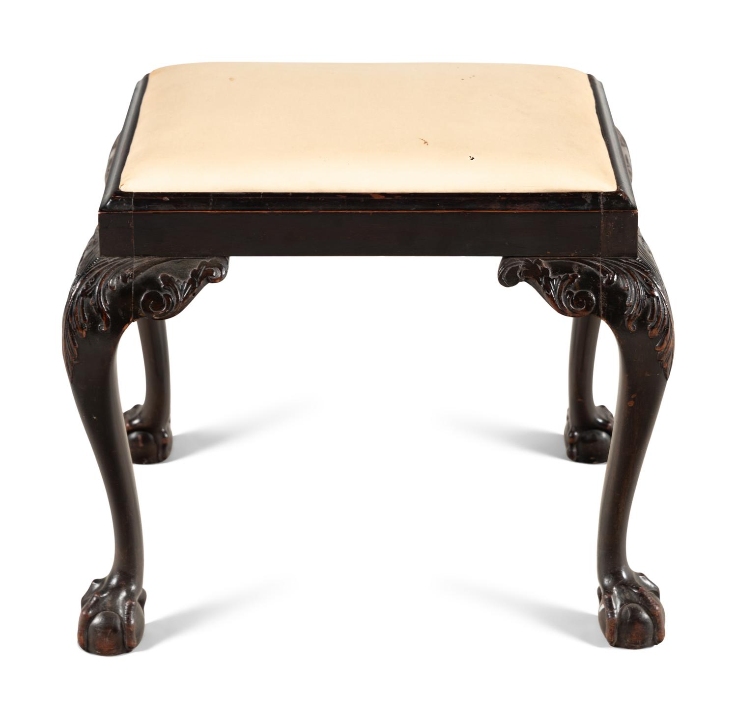 An English Carved Mahogany Stool