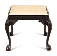 An English Carved Mahogany Stool