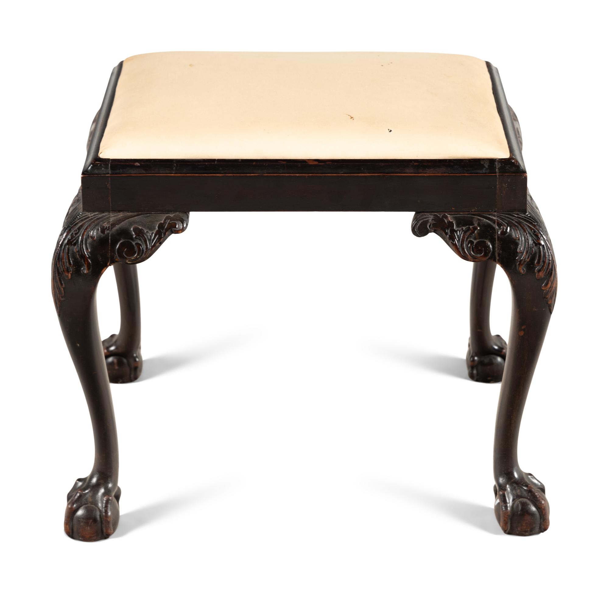 An English Carved Mahogany Stool