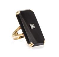 A 14 Karat Yellow Gold, Onyx and Diamond Ring, 4.40 dwts.