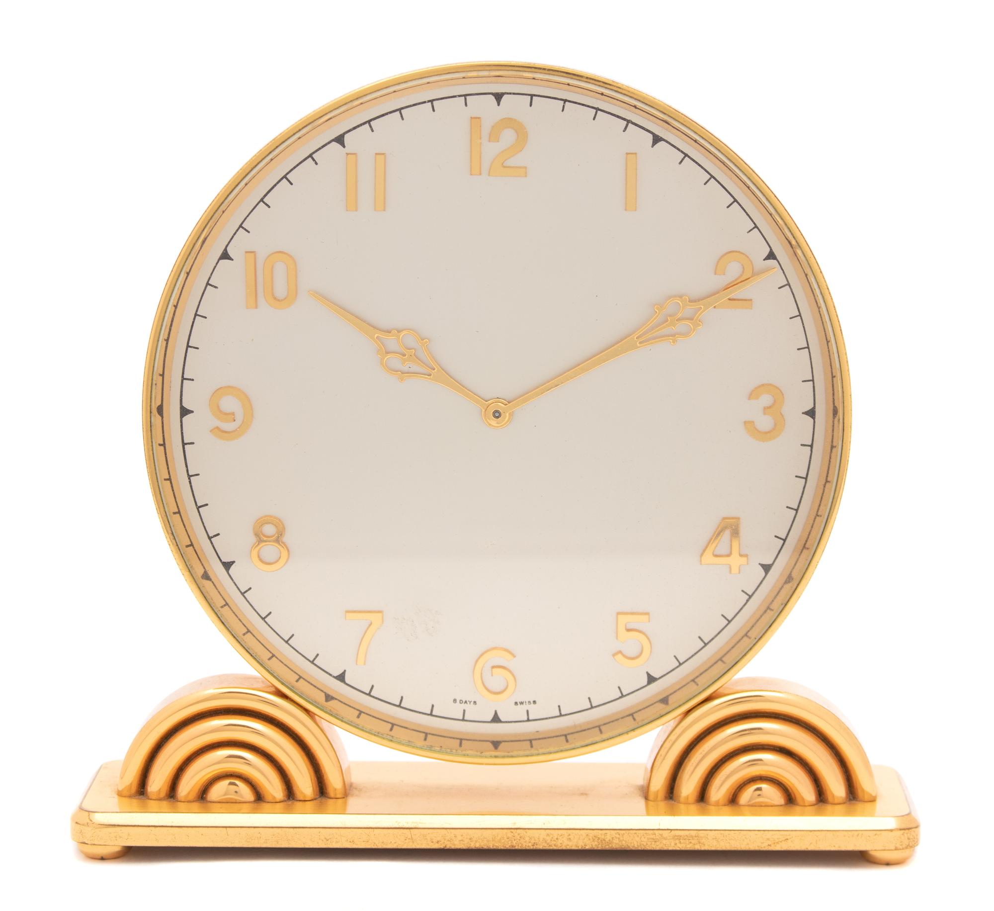 An Art Deco Boxed Brass Boudoir Timepiece Height 6 1/2 x width 7 inches. — SWISS, CIRCA 1930