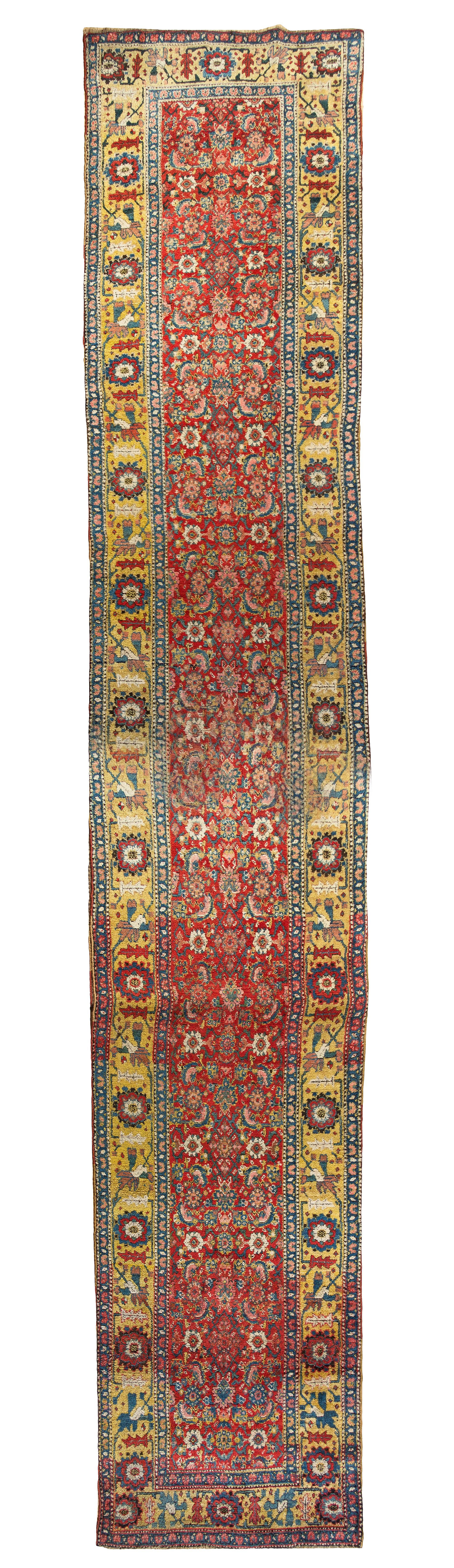 A Persian Wool Runner 22 feet 2 inches x 3 feet 8 inches.