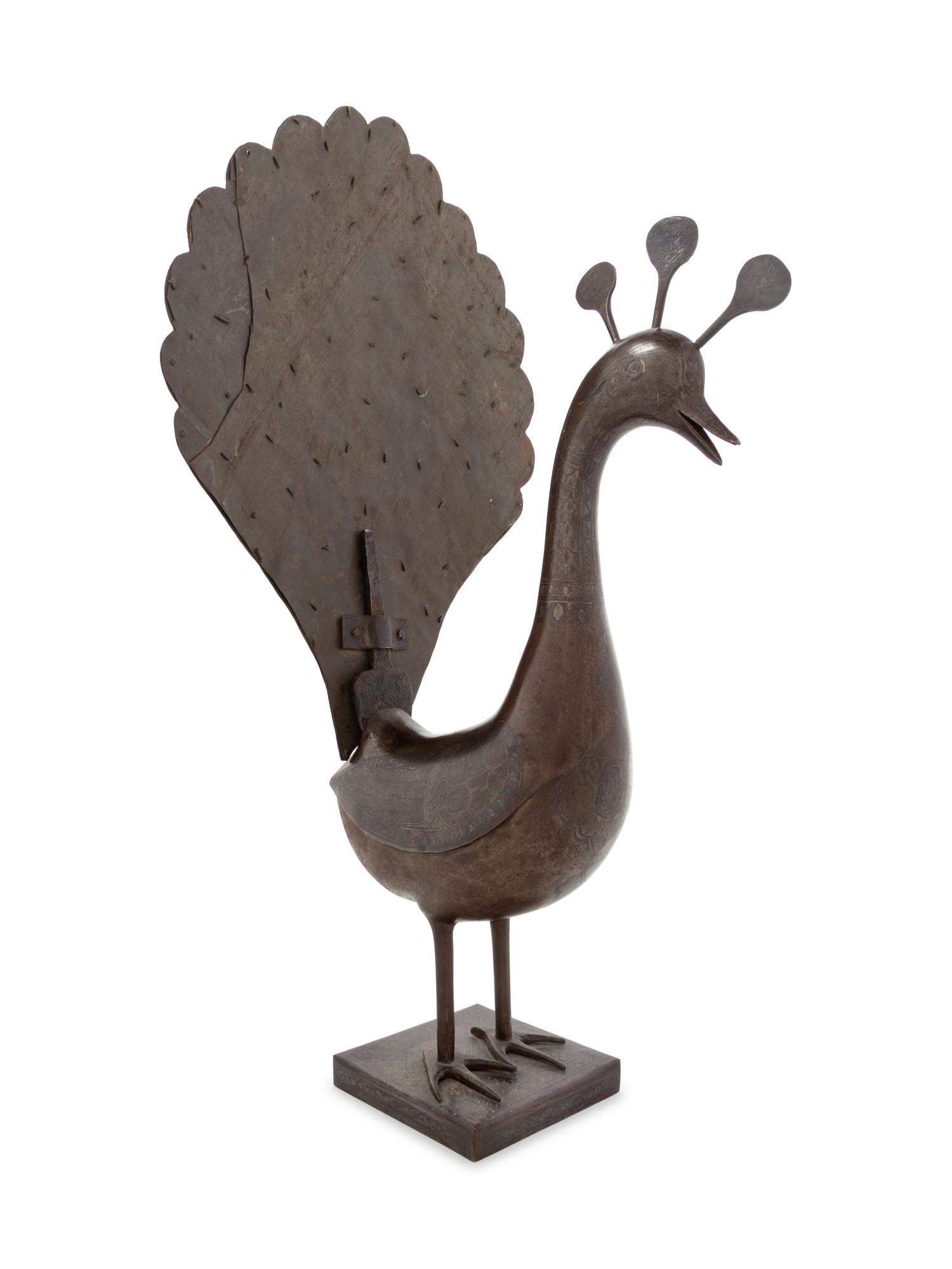A Qajar Damascened Steel Peacock