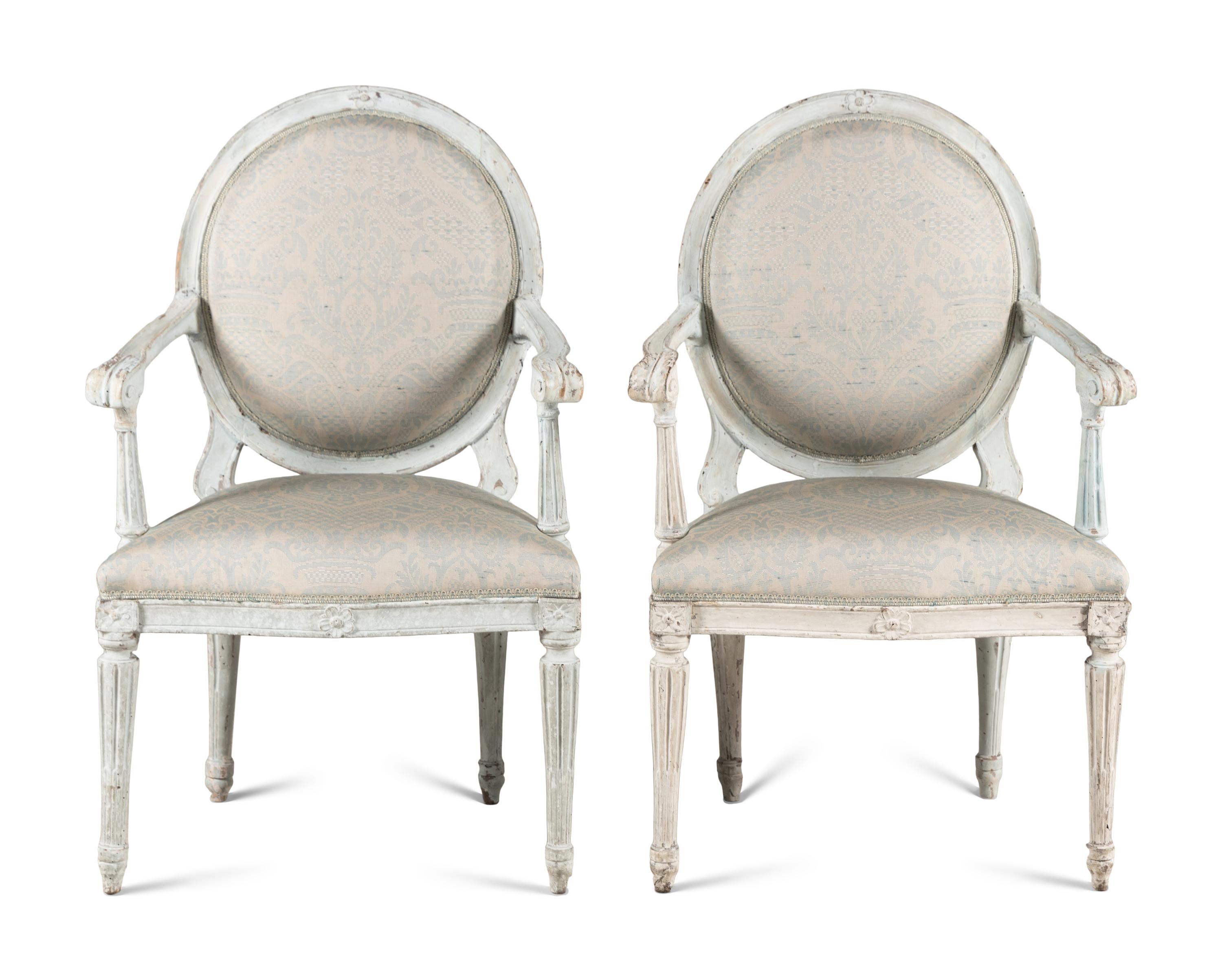 A Pair of Louis Philippe White Painted Fauteuils