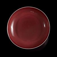 A Chinese copper-red glazed porcelain dish 釉里红瓷盘 Qianlong six-character seal mark and of the period ????? ? ??