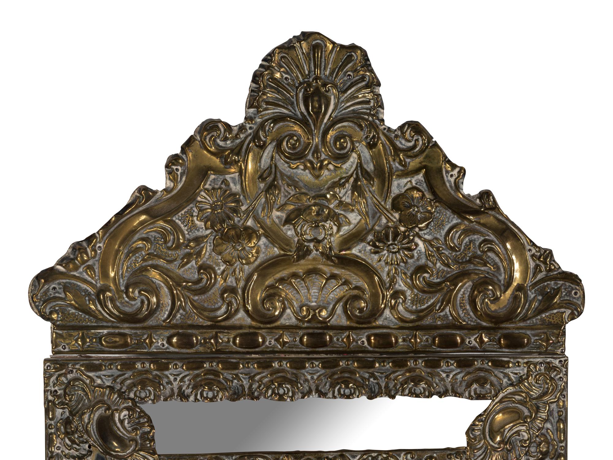 A Pair of Dutch Repousse Mirrors