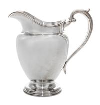 An American Silver Water Pitcher, Gorham Mfg. Co., Providence, RI, of ovoid handled form, retailed by J.E. Caldwell & Co.