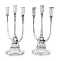 A Pair of Harald Nielsen for Georg Jensen Silver Three-Light Candelabra