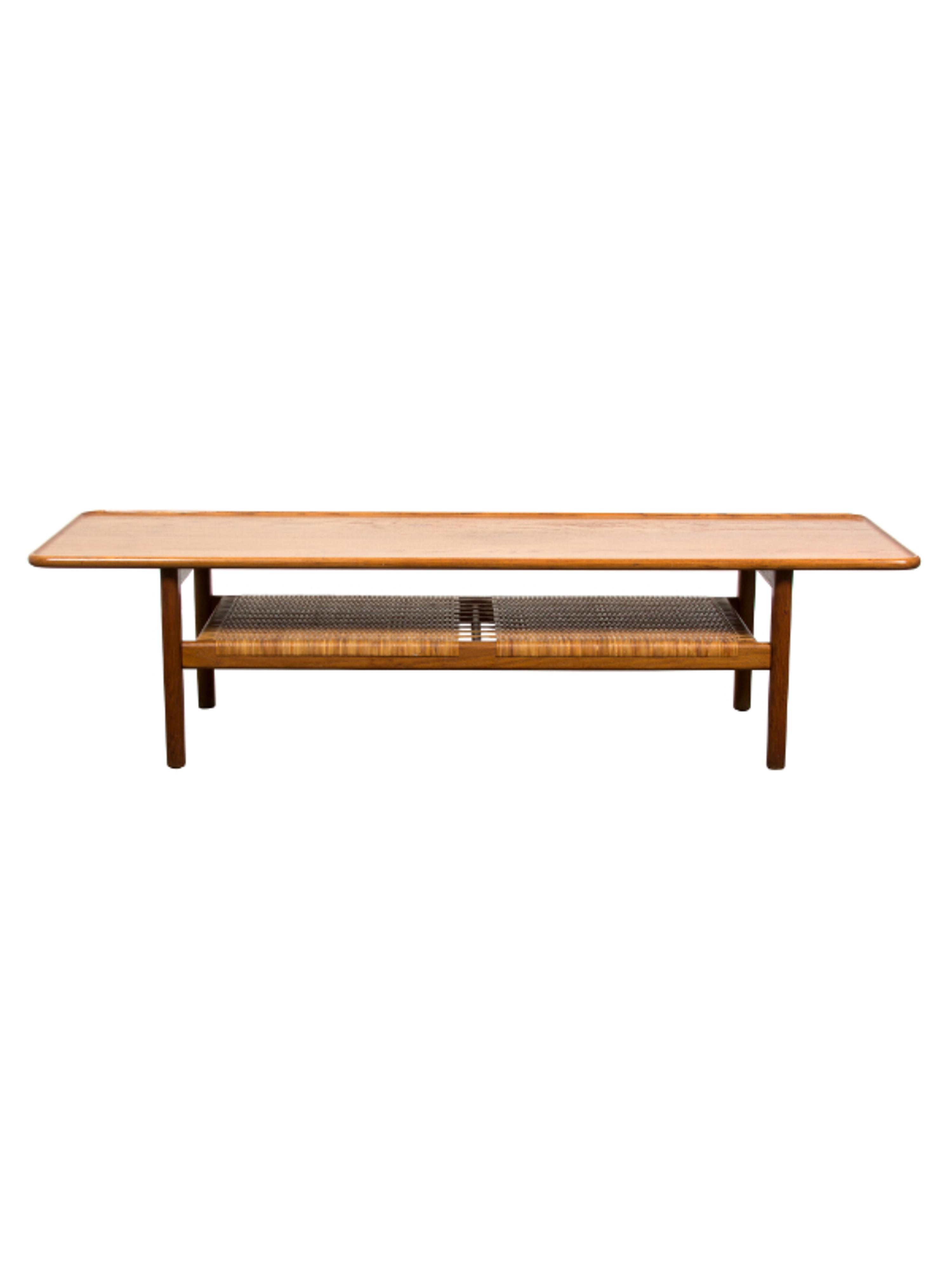 Hans Wegner (Danish, 1914-2007), ANDREAS TUCK, 1955, table having a broad tabletop with a rounded and raised edge, the magazine shelf u