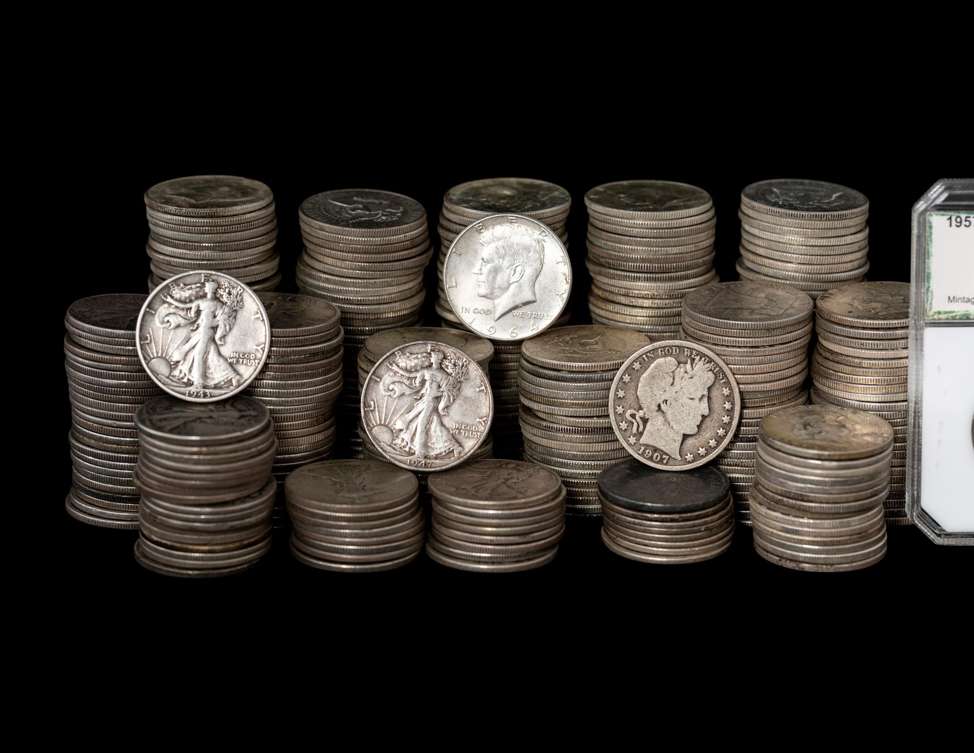 A Large Collection of Pre-1965 50c Coins