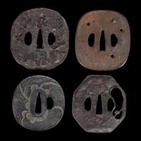 Group of twelve assorted Japanese iron tsuba