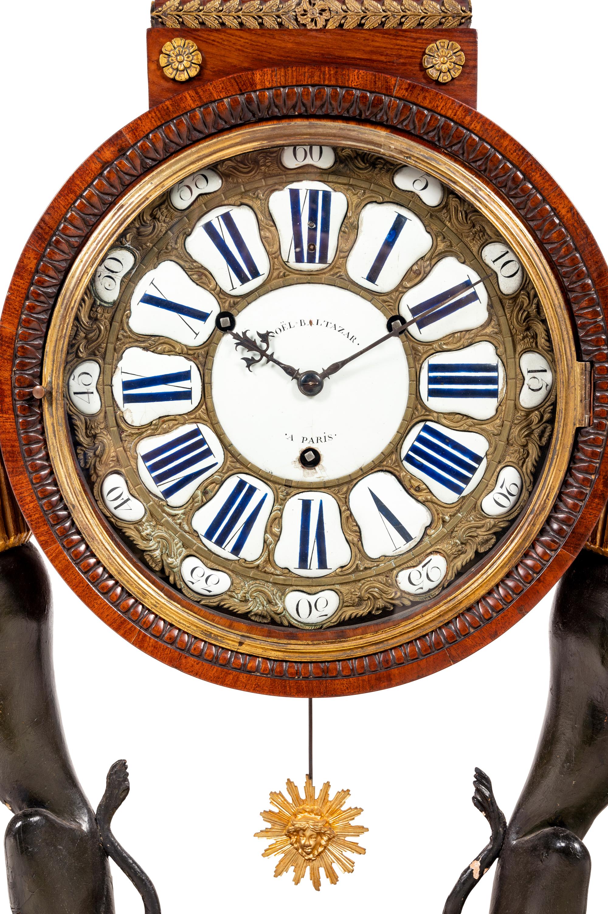 A French Egyptian Revival Gilt Bronze Mounted Mahogany Clock