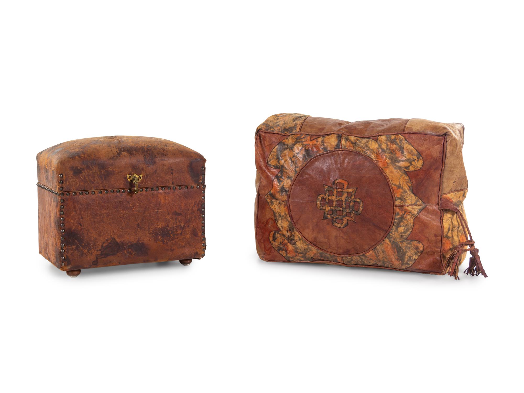 A Leather Upholstered Trunk and Pouf