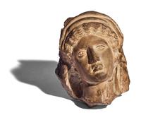 A Greek Terracotta Female Head