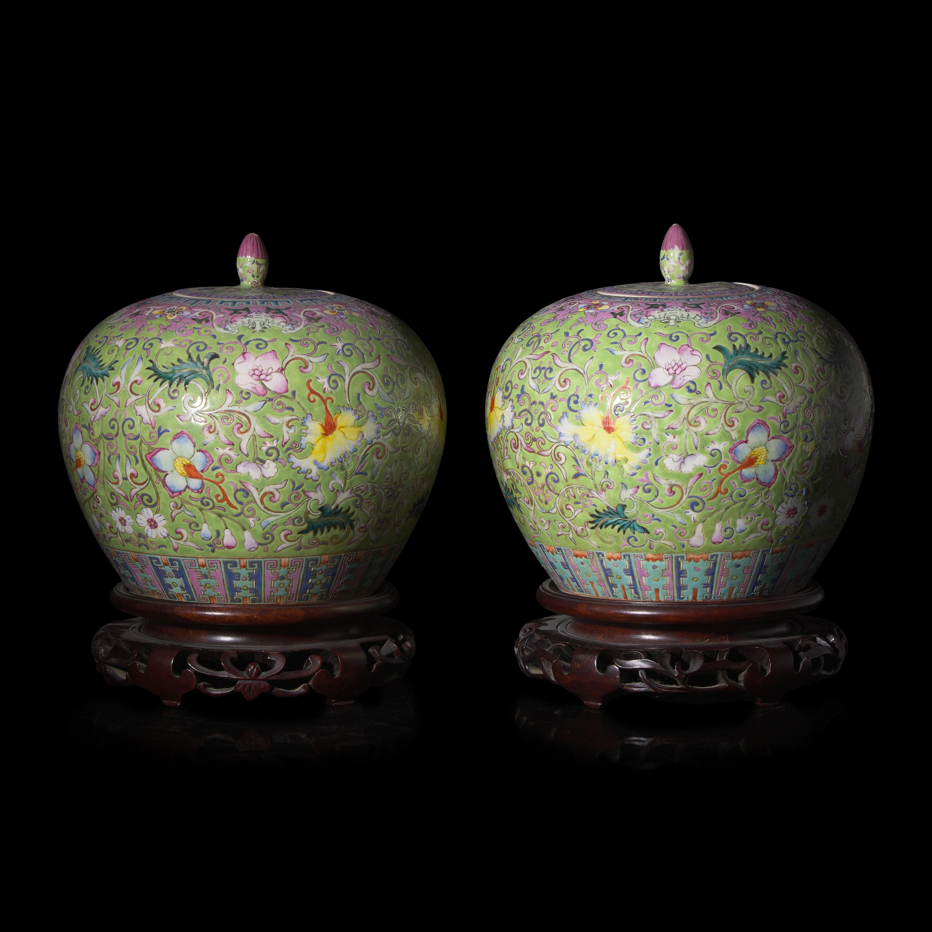 A Pair of Chinese Famille Rose Green Ground Covered Jars — 粉彩蘋果綠地纏枝花卉紋蓋罐一對