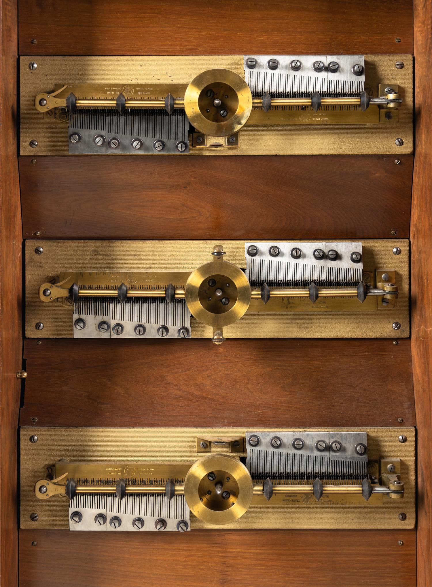 A Symphonion Style 38B Eroica Upright Three Disc Music Box with Clock