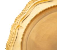 A Set of Eight Gilt Silver-Plate Chargers