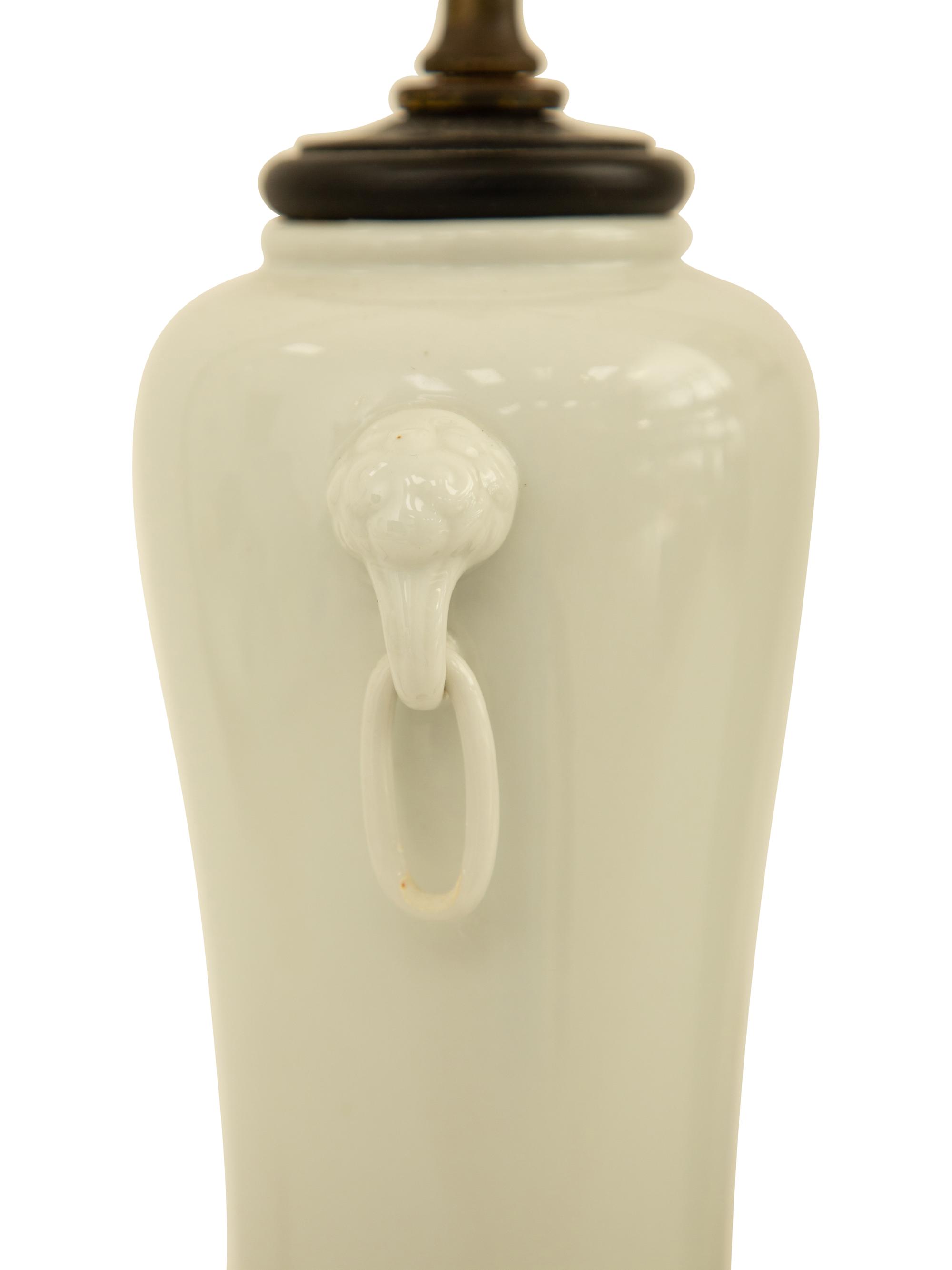 A Pair of Chinese Blanc de Chine Porcelain Lamps