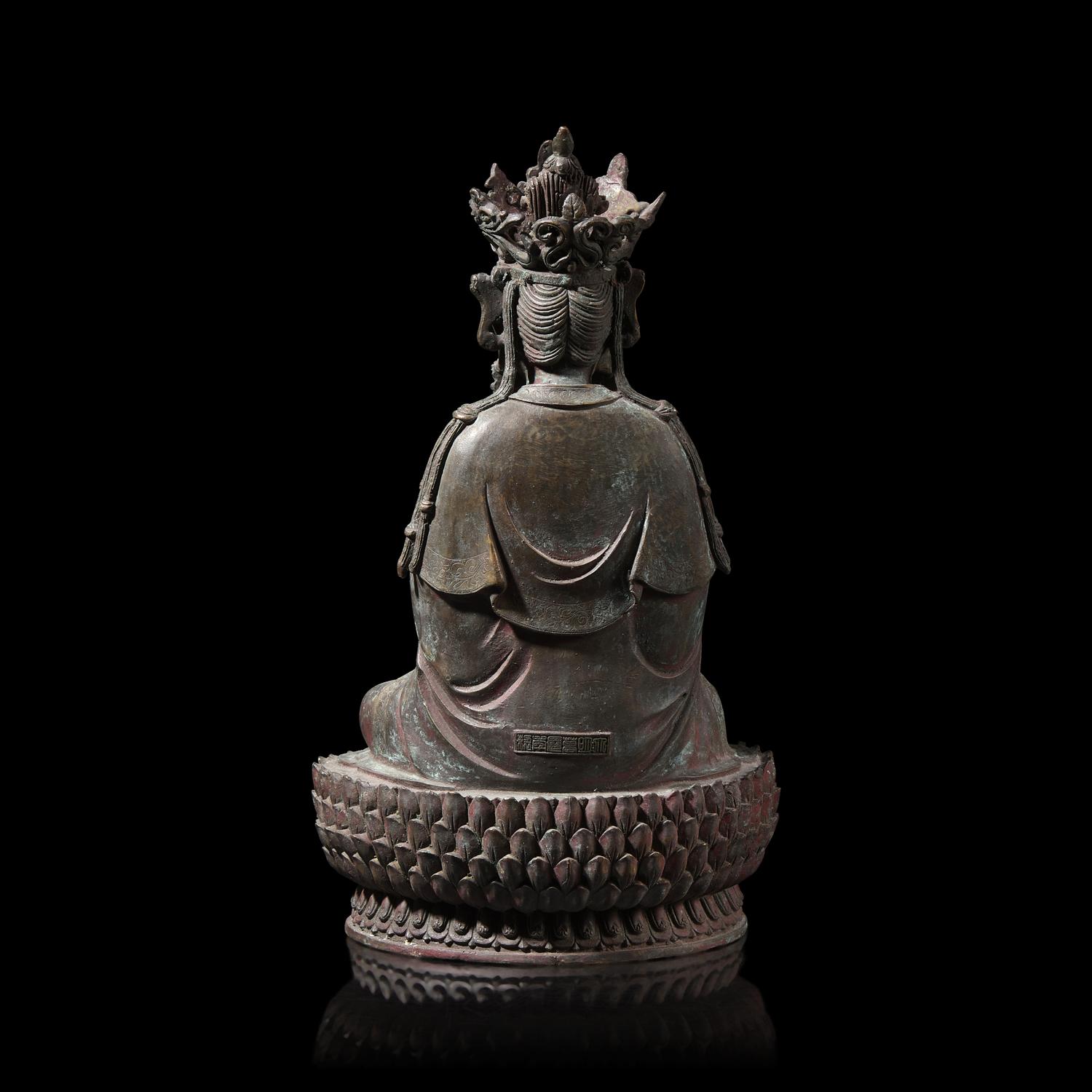 A Chinese Patinated Bronze Figure of a Seated Bodhisattva 銅觀音坐像