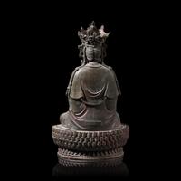 A Chinese Patinated Bronze Figure of a Seated Bodhisattva 銅觀音坐像