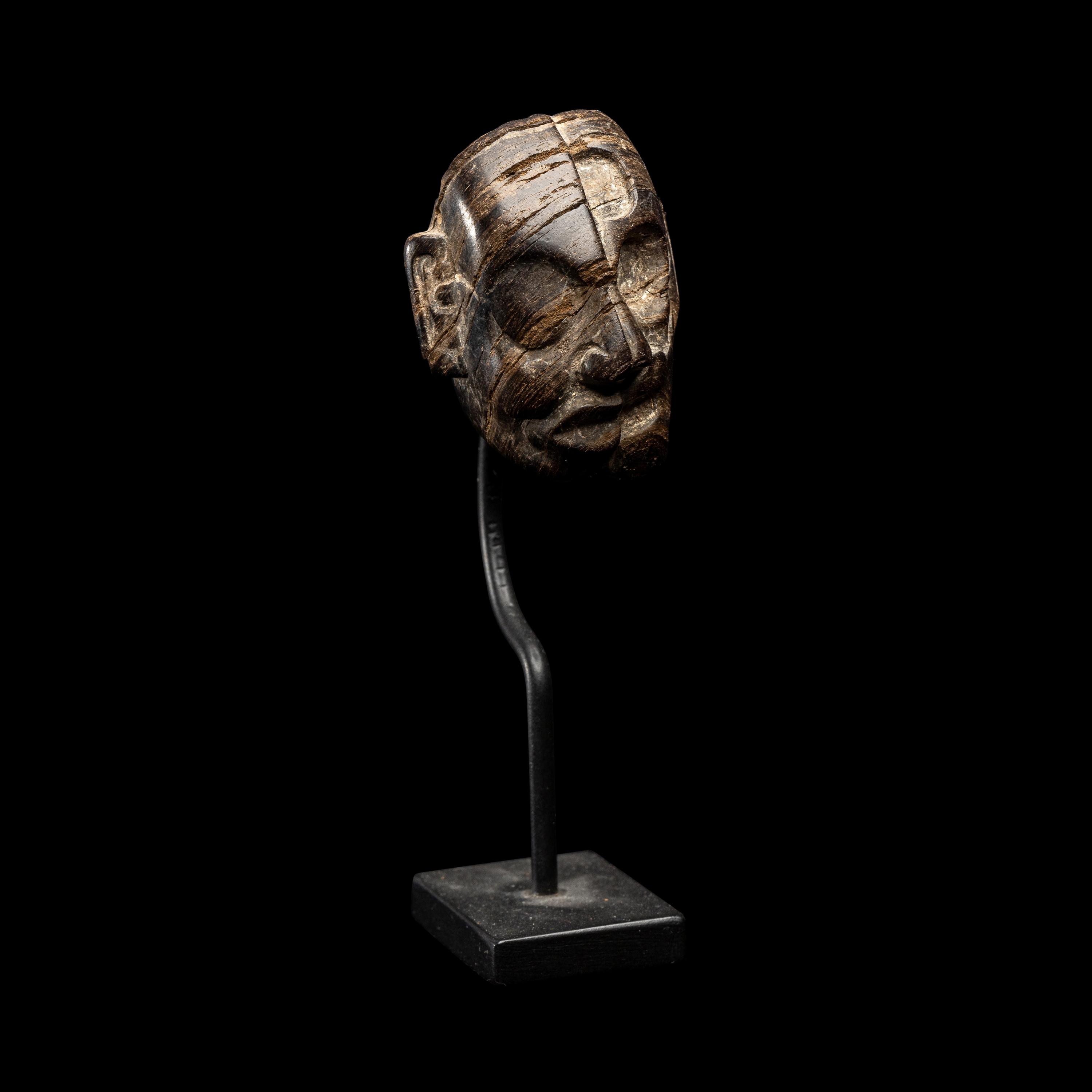A Maya Wood Head Pendant