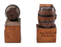 Two Prohibition Era 'John Barleycorn' Folk Art Carved Whiskey Barrels