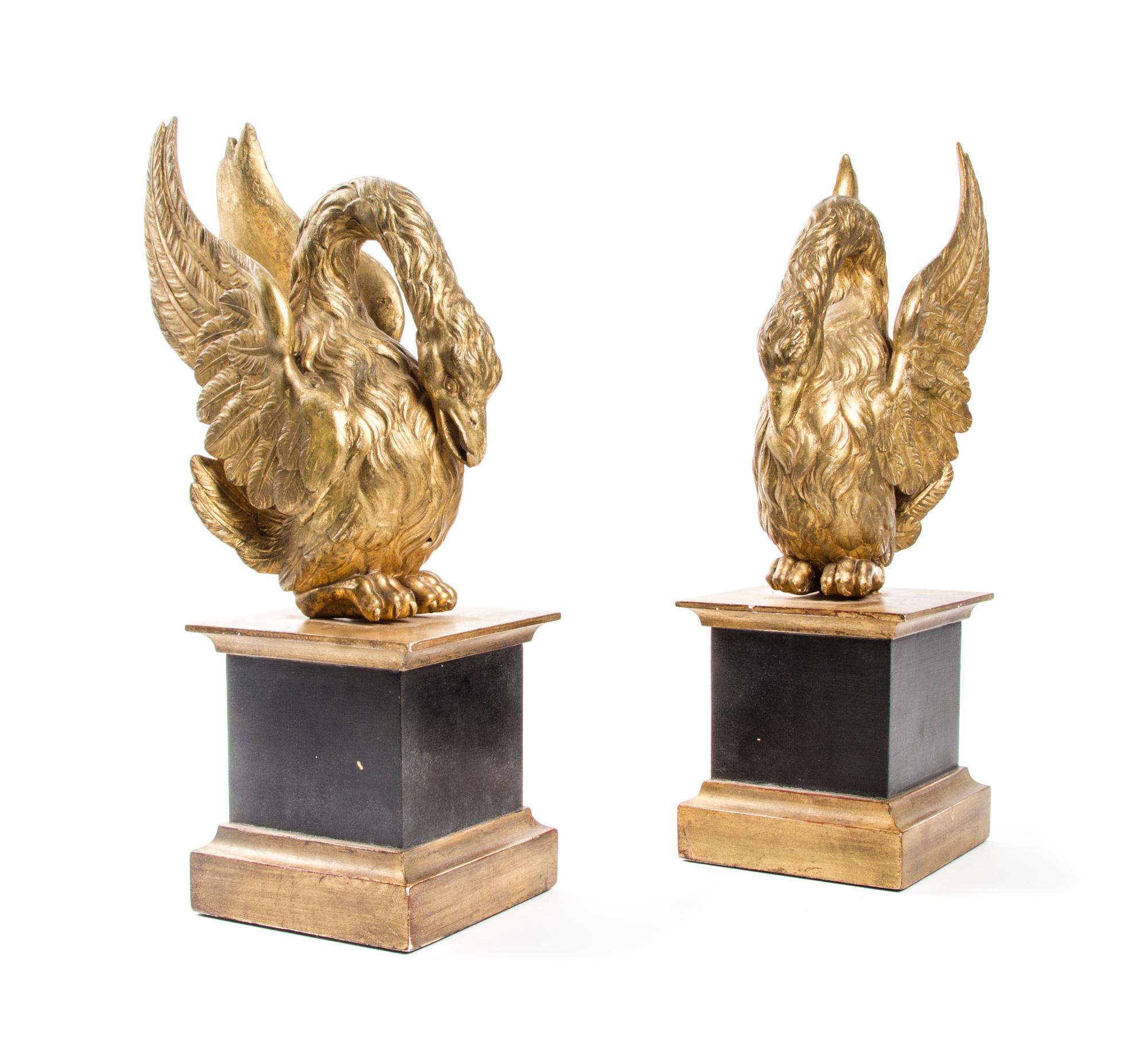 A Pair of Empire Giltwood Swans, Height 14 1/8 inches.