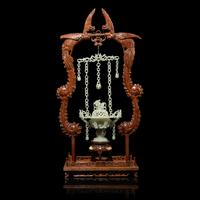 A Chinese Celadon Jade Hanging Incense Burner, 20th Century — 近代 青玉鏈式爐