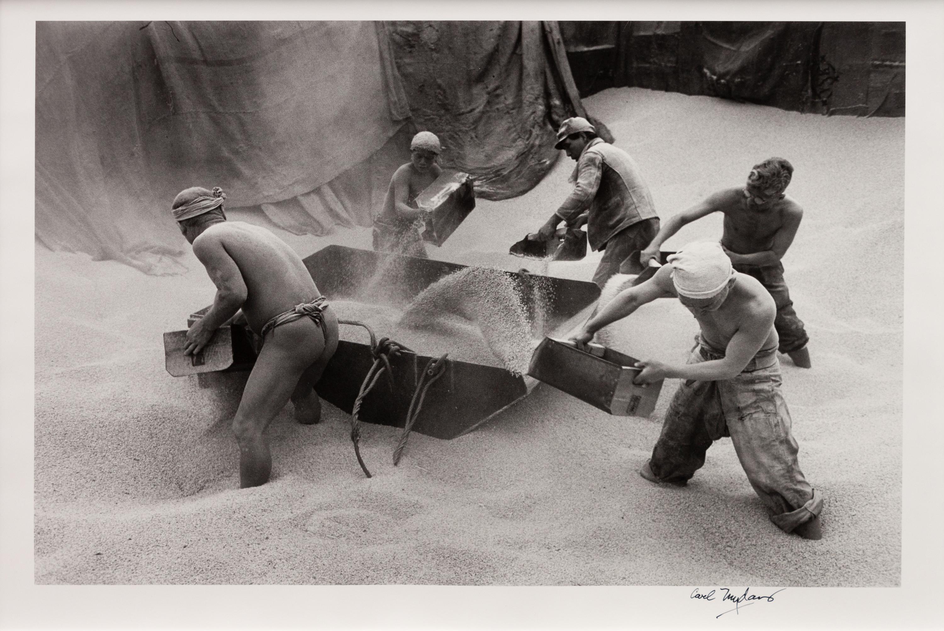 A group of four photographs ( Ministers Meeting, Rome, 1940; Preparing the Land to Plant Rice , 1949; Unloading Rice at Kobe , 1949; Bricks for Building, Greenbelt, MD, c. 1939)