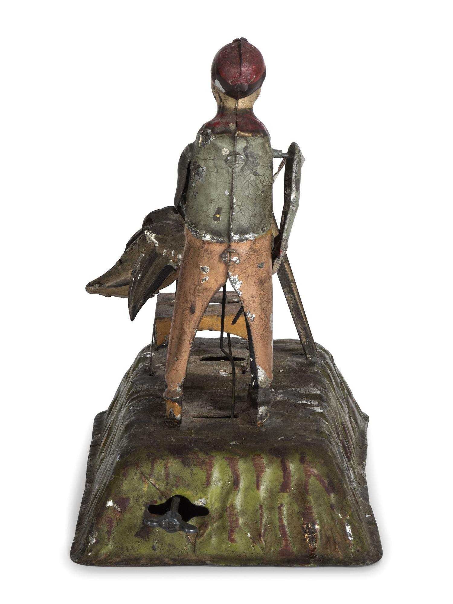 A Gunthermann Hand-Painted Tin and Paper Windup Toy