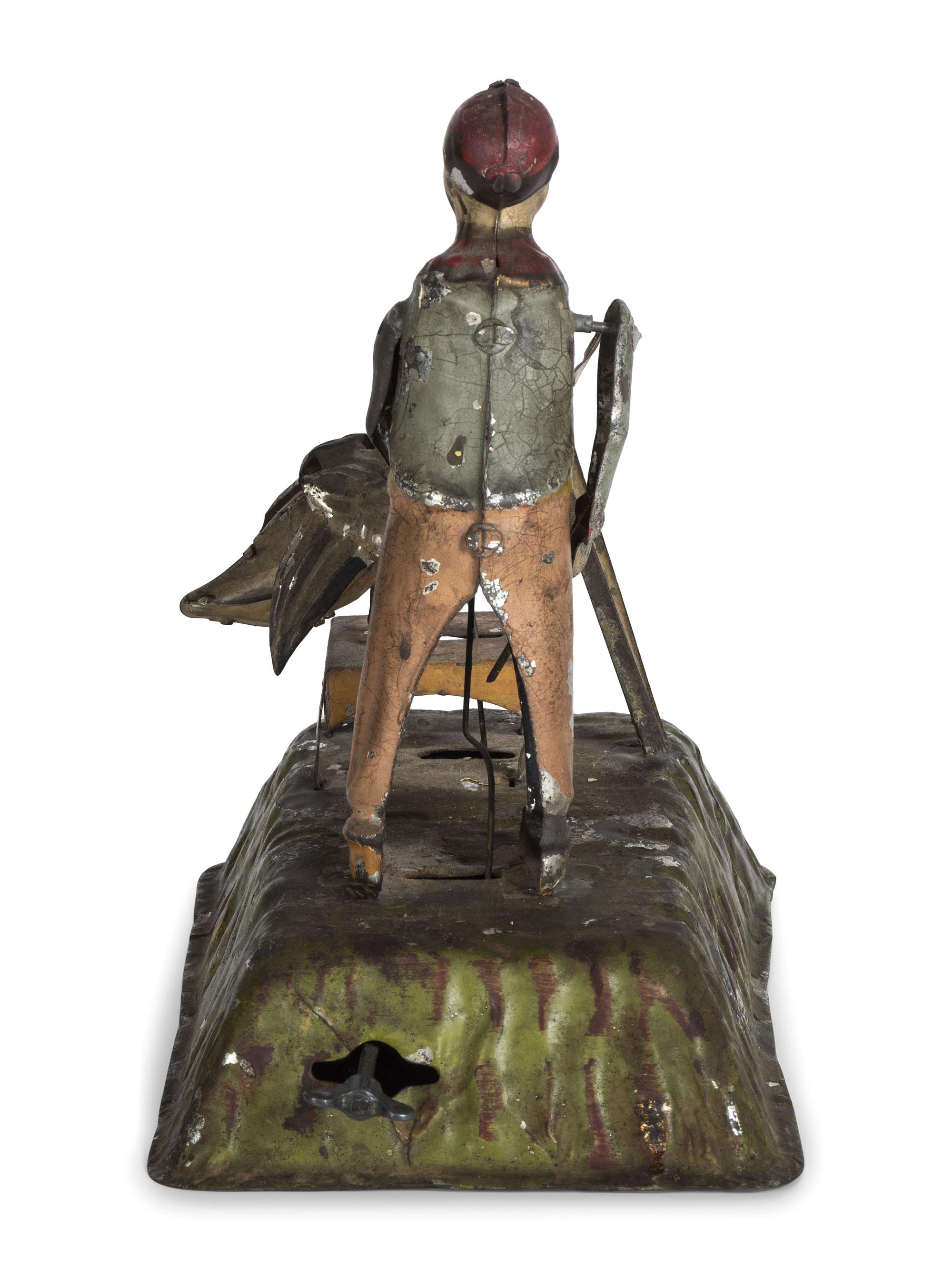 A Gunthermann Hand-Painted Tin and Paper Windup Toy