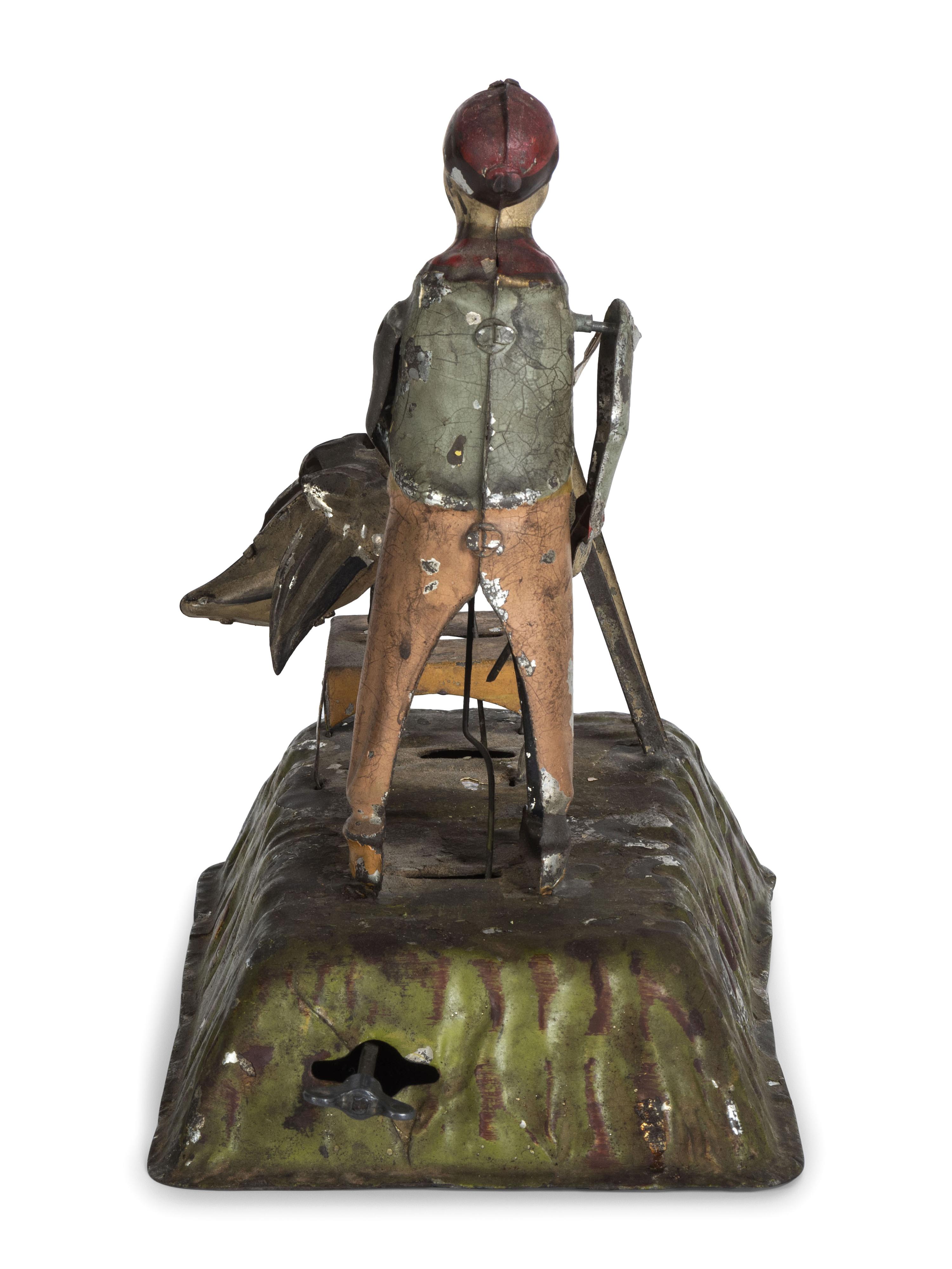 A Gunthermann Hand-Painted Tin and Paper Windup Toy