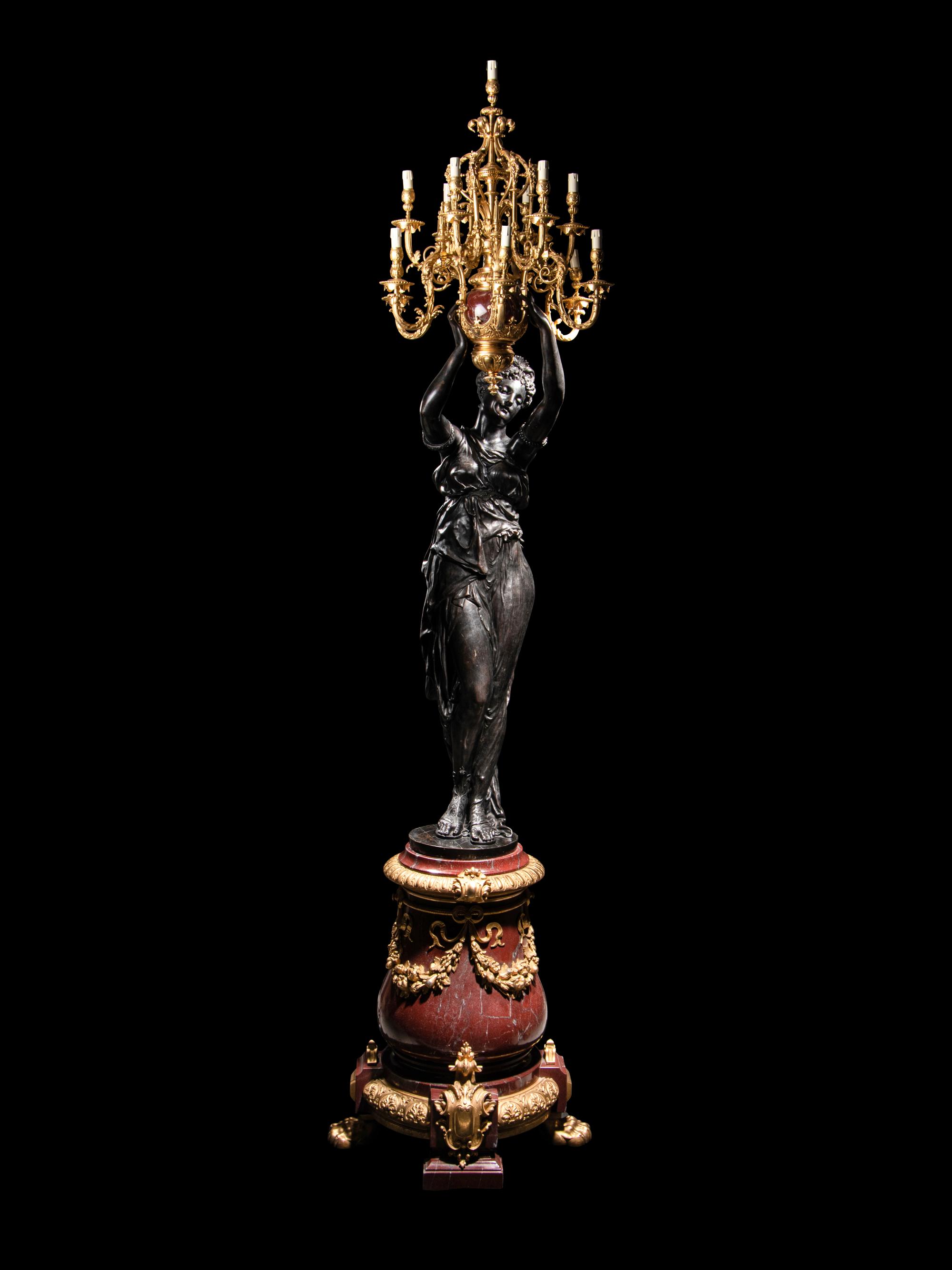A Pair of Monumental Gilt and Patinated Bronze and Rouge Marble Figural Torchères